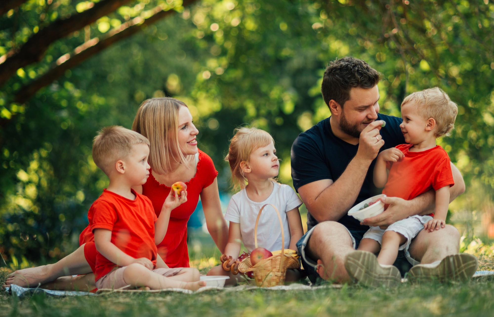 Canadian family enjoying time together outdoors, representing family financial planning, retirement and legacy strategies with GFI Canada